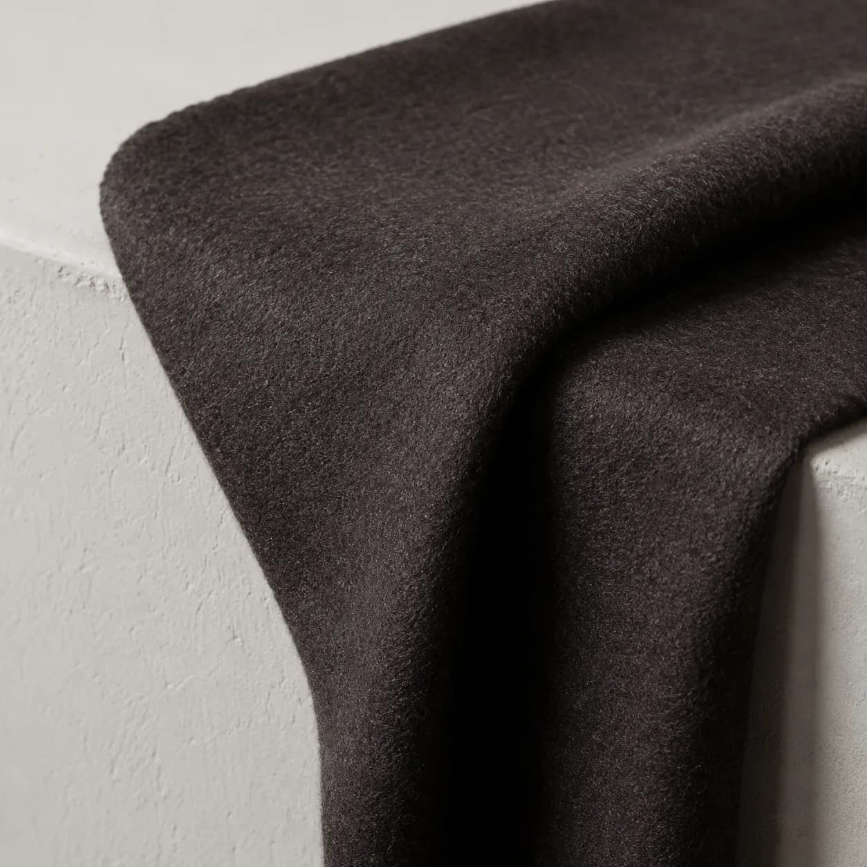 Brushed wool flannel in dark brown, close detail